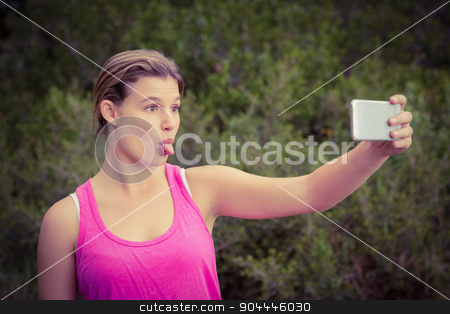 To use this stock image in your creative project, please select the size you need over to the right and click the "Add to Cart" button.
Your downloaded image will come with the Cutcaster watermark removed so don’t worry about the watermark you see on this page. Pretty blonde athlete taking selfies with outstretched tongue stock photo, Pretty blonde athlete taking selfies with outstretched tongue in the nature by Wavebreak Media