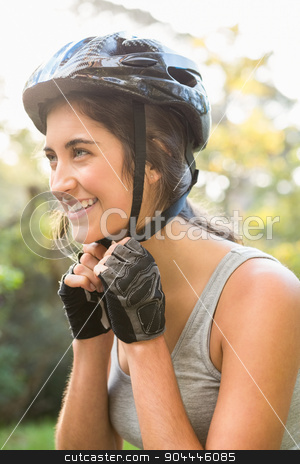 To use this stock image in your creative project, please select the size you need over to the right and click the "Add to Cart" button.
Your downloaded image will come with the Cutcaster watermark removed so don’t worry about the watermark you see on this page. Smiling athletic brunette putting on helmet stock photo, Smiling athletic brunette putting on helmet in the nature by Wavebreak Media