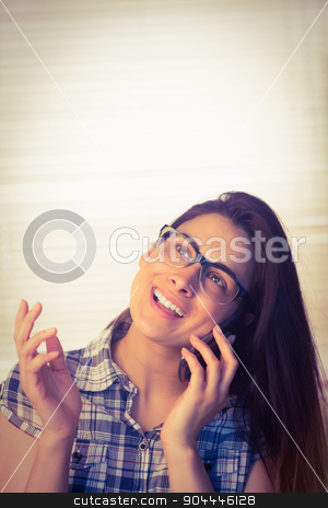 To use this stock image in your creative project, please select the size you need over to the right and click the "Add to Cart" button.
Your downloaded image will come with the Cutcaster watermark removed so don’t worry about the watermark you see on this page. Pretty hipster on the phone stock photo, Pretty hipster on the phone in a bright room by Wavebreak Media