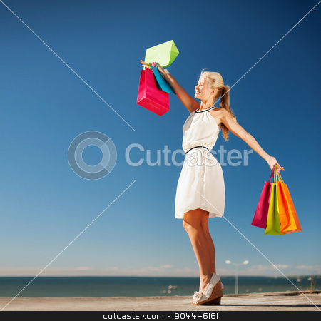 To use this stock image in your creative project, please select the size you need over to the right and click the "Add to Cart" button.
Your downloaded image will come with the Cutcaster watermark removed so don’t worry about the watermark you see on this page. woman with shopping bags stock photo, shopping and tourism concept - woman with shopping bags by Syda Productions