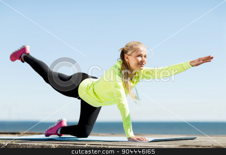To use this stock image in your creative project, please select the size you need over to the right and click the "Add to Cart" button.
Your downloaded image will come with the Cutcaster watermark removed so don’t worry about the watermark you see on this page. woman doing sports outdoors stock photo, sport and lifestyle concept - woman doing sports outdoors by Syda Productions