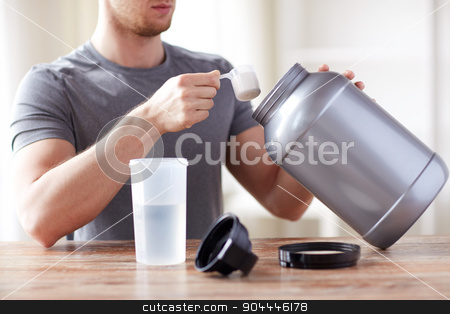 To use this stock image in your creative project, please select the size you need over to the right and click the "Add to Cart" button.
Your downloaded image will come with the Cutcaster watermark removed so don’t worry about the watermark you see on this page. close up of man with protein shake bottle and jar stock photo, sport, fitness, healthy lifestyle and people concept - close up of man with jar and bottle preparing protein shake by Syda Productions
