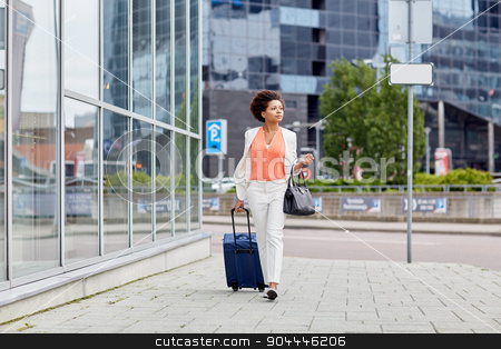 To use this stock image in your creative project, please select the size you need over to the right and click the "Add to Cart" button.
Your downloaded image will come with the Cutcaster watermark removed so don’t worry about the watermark you see on this page. young african woman with travel bag in city stock photo, travel, business trip, people and tourism concept - young african american woman with travel bag walking down city street by Syda Productions