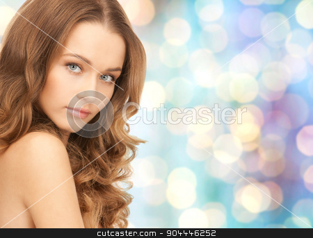 To use this stock image in your creative project, please select the size you need over to the right and click the "Add to Cart" button.
Your downloaded image will come with the Cutcaster watermark removed so don’t worry about the watermark you see on this page. beautiful young woman face stock photo, beauty, people and health concept - beautiful young woman face over blue holidays lights background by Syda Productions