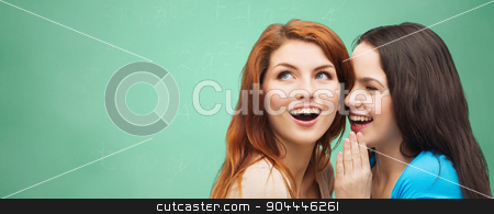 To use this stock image in your creative project, please select the size you need over to the right and click the "Add to Cart" button.
Your downloaded image will come with the Cutcaster watermark removed so don’t worry about the watermark you see on this page. happy student girls whispering secret or gossip stock photo, school, education, friendship, secrecy and people concept - two smiling student girls or young women whispering gossip over green chalk board background by Syda Productions