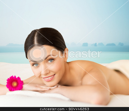 To use this stock image in your creative project, please select the size you need over to the right and click the "Add to Cart" button.
Your downloaded image will come with the Cutcaster watermark removed so don’t worry about the watermark you see on this page. happy beautiful woman lying in spa stock photo, people, beauty and body care concept - happy beautiful woman lying on massage desk at spa resort over sea and infinity pool background by Syda Productions