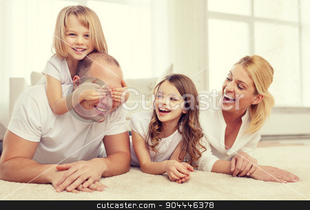 To use this stock image in your creative project, please select the size you need over to the right and click the "Add to Cart" button.
Your downloaded image will come with the Cutcaster watermark removed so don’t worry about the watermark you see on this page. parents and two girls lying on floor at home stock photo, family, children and home concept - smiling family with and two little girls lying on floor at home and having fun by Syda Productions