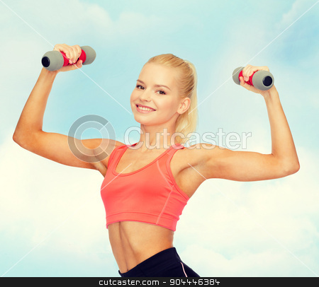 To use this stock image in your creative project, please select the size you need over to the right and click the "Add to Cart" button.
Your downloaded image will come with the Cutcaster watermark removed so don’t worry about the watermark you see on this page. smiling beautiful sporty woman with dumbbells stock photo, fitness, sport and diet concept - smiling beautiful sporty woman with dumbbells by Syda Productions
