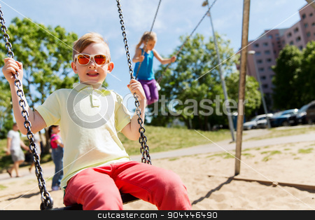 To use this stock image in your creative project, please select the size you need over to the right and click the "Add to Cart" button.
Your downloaded image will come with the Cutcaster watermark removed so don’t worry about the watermark you see on this page. two happy kids swinging on swing at playground stock photo, summer, childhood, leisure, friendship and people concept - two happy kids swinging on swing at children playground by Syda Productions