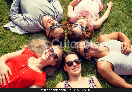 To use this stock image in your creative project, please select the size you need over to the right and click the "Add to Cart" button.
Your downloaded image will come with the Cutcaster watermark removed so don’t worry about the watermark you see on this page. group of smiling friends lying on grass outdoors stock photo, friendship, leisure, summer and people concept - group of smiling friends lying on grass in circle outdoors by Syda Productions
