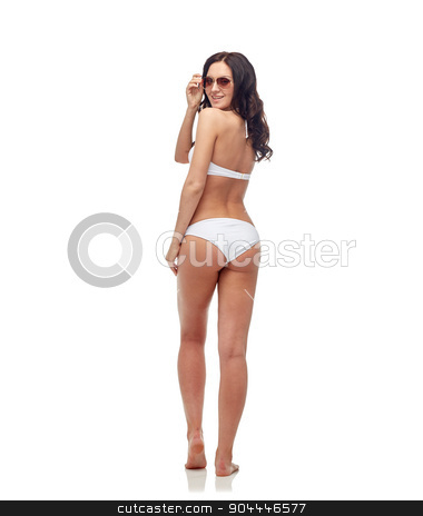 To use this stock image in your creative project, please select the size you need over to the right and click the "Add to Cart" button.
Your downloaded image will come with the Cutcaster watermark removed so don’t worry about the watermark you see on this page. happy woman in sunglasses and bikini swimsuit stock photo, people, fashion, swimwear, summer and beach concept - happy young woman in sunglasses and white swimsuit looking back by Syda Productions