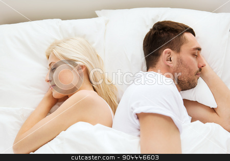 To use this stock image in your creative project, please select the size you need over to the right and click the "Add to Cart" button.
Your downloaded image will come with the Cutcaster watermark removed so don’t worry about the watermark you see on this page. couple sleeping in bed at home stock photo, people, rest, bedtime and family concept - couple sleeping back to back in bed at home by Syda Productions