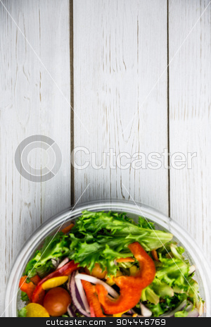 To use this stock image in your creative project, please select the size you need over to the right and click the "Add to Cart" button.
Your downloaded image will come with the Cutcaster watermark removed so don’t worry about the watermark you see on this page. Healthy bowl of salad on table stock photo, Healthy bowl of salad on table shot in studio by Wavebreak Media
