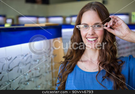 To use this stock image in your creative project, please select the size you need over to the right and click the "Add to Cart" button.
Your downloaded image will come with the Cutcaster watermark removed so don’t worry about the watermark you see on this page. Pretty woman shopping for new glasses stock photo, Pretty woman shopping for new glasses at the optometry store by Wavebreak Media