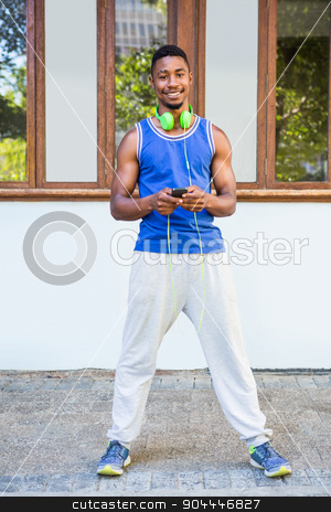 To use this stock image in your creative project, please select the size you need over to the right and click the "Add to Cart" button.
Your downloaded image will come with the Cutcaster watermark removed so don’t worry about the watermark you see on this page. An handsome athlete about to listen to music stock photo, An handsome athlete about to listen to music on a sunny day by Wavebreak Media