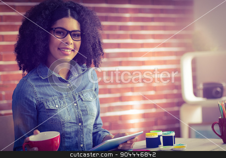 To use this stock image in your creative project, please select the size you need over to the right and click the "Add to Cart" button.
Your downloaded image will come with the Cutcaster watermark removed so don’t worry about the watermark you see on this page. Casual businesswoman on a coffee break stock photo, Casual businesswoman on a coffee break in her office by Wavebreak Media