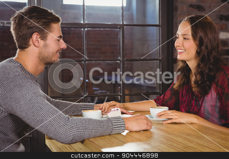 To use this stock image in your creative project, please select the size you need over to the right and click the "Add to Cart" button.
Your downloaded image will come with the Cutcaster watermark removed so don’t worry about the watermark you see on this page. Smiling couple holding hands and having coffee together stock photo, Smiling couple holding hands and having coffee together at coffee shop by Wavebreak Media