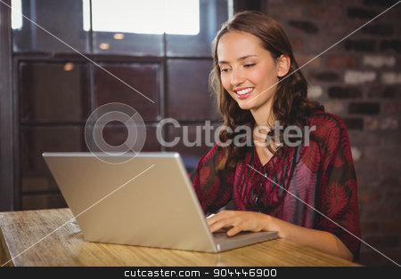 To use this stock image in your creative project, please select the size you need over to the right and click the "Add to Cart" button.
Your downloaded image will come with the Cutcaster watermark removed so don’t worry about the watermark you see on this page. Smiling brunette using laptop stock photo, Smiling brunette using laptop at coffee shop by Wavebreak Media