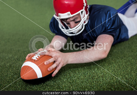 To use this stock image in your creative project, please select the size you need over to the right and click the "Add to Cart" button.
Your downloaded image will come with the Cutcaster watermark removed so don’t worry about the watermark you see on this page. American football player scoring a touchdown stock photo, Determined american football player scoring a touchdown on the field by Wavebreak Media