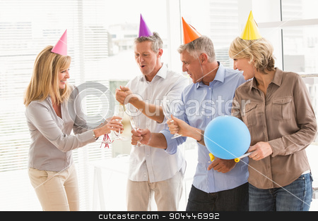 To use this stock image in your creative project, please select the size you need over to the right and click the "Add to Cart" button.
Your downloaded image will come with the Cutcaster watermark removed so don’t worry about the watermark you see on this page. Casual business people toasting and celebrating birthday stock photo, Casual business people toasting and celebrating birthday in the office by Wavebreak Media