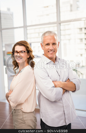 To use this stock image in your creative project, please select the size you need over to the right and click the "Add to Cart" button.
Your downloaded image will come with the Cutcaster watermark removed so don’t worry about the watermark you see on this page. Smiling casual business colleagues with arms crossed stock photo, Portrait of smiling casual business colleagues with arms crossed in the office by Wavebreak Media