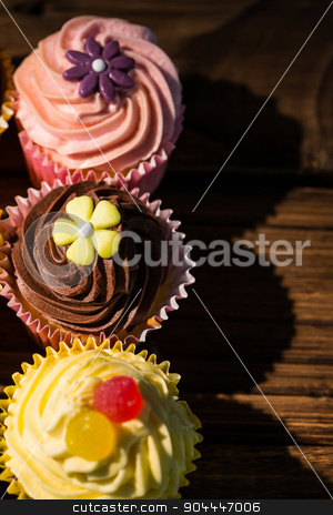 To use this stock image in your creative project, please select the size you need over to the right and click the "Add to Cart" button.
Your downloaded image will come with the Cutcaster watermark removed so don’t worry about the watermark you see on this page. Delicious cupcakes on a table stock photo, Delicious cupcakes on a table shot in studio by Wavebreak Media