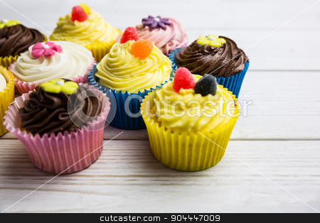 To use this stock image in your creative project, please select the size you need over to the right and click the "Add to Cart" button.
Your downloaded image will come with the Cutcaster watermark removed so don’t worry about the watermark you see on this page. Delicious cupcakes on a table stock photo, Delicious cupcakes on a table shot in studio by Wavebreak Media