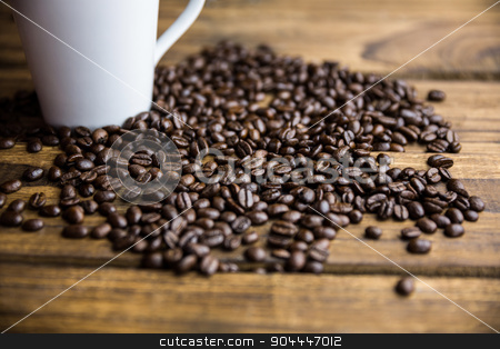 To use this stock image in your creative project, please select the size you need over to the right and click the "Add to Cart" button.
Your downloaded image will come with the Cutcaster watermark removed so don’t worry about the watermark you see on this page. Coffee beans on a table with cup stock photo, Coffee beans on a table with cup shot in studio by Wavebreak Media