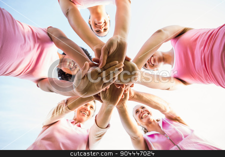 To use this stock image in your creative project, please select the size you need over to the right and click the "Add to Cart" button.
Your downloaded image will come with the Cutcaster watermark removed so don’t worry about the watermark you see on this page. Women wearing pink for breast cancer and putting hands together stock photo, Women wearing pink for breast cancer and putting hands together in parkland by Wavebreak Media