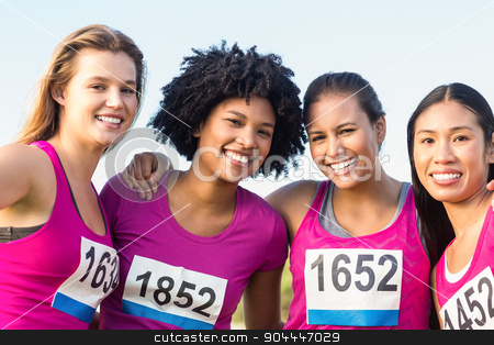To use this stock image in your creative project, please select the size you need over to the right and click the "Add to Cart" button.
Your downloaded image will come with the Cutcaster watermark removed so don’t worry about the watermark you see on this page. Four smiling runners supporting breast cancer marathon stock photo, Portrait of four smiling runners supporting breast cancer marathon in parkland by Wavebreak Media