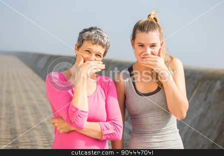 To use this stock image in your creative project, please select the size you need over to the right and click the "Add to Cart" button.
Your downloaded image will come with the Cutcaster watermark removed so don’t worry about the watermark you see on this page. Sporty mother and daughter laughing stock photo, Portrait of sporty mother and daughter laughing at promenade by Wavebreak Media