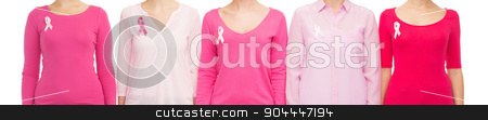 To use this stock image in your creative project, please select the size you need over to the right and click the "Add to Cart" button.
Your downloaded image will come with the Cutcaster watermark removed so don’t worry about the watermark you see on this page. close up of women with cancer awareness ribbons stock photo, healthcare, people and medicine concept - close up of women in blank shirts with pink breast cancer awareness ribbons over white background by Syda Productions