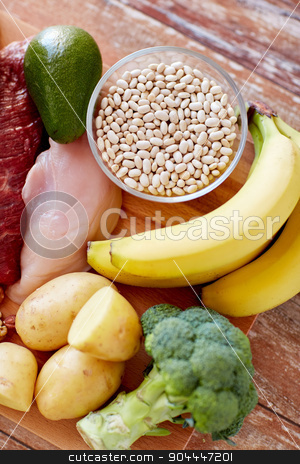 To use this stock image in your creative project, please select the size you need over to the right and click the "Add to Cart" button.
Your downloaded image will come with the Cutcaster watermark removed so don’t worry about the watermark you see on this page. close up of different food items on table stock photo, balanced diet, cooking, culinary and food concept - close up of different food items on wooden table by Syda Productions