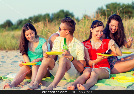 To use this stock image in your creative project, please select the size you need over to the right and click the "Add to Cart" button.
Your downloaded image will come with the Cutcaster watermark removed so don’t worry about the watermark you see on this page. smiling friends sitting on summer beach stock photo, friendship, happiness, summer vacation, holidays and people concept - group of smiling friends having picnic on beach by Syda Productions