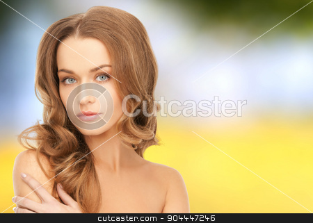To use this stock image in your creative project, please select the size you need over to the right and click the "Add to Cart" button.
Your downloaded image will come with the Cutcaster watermark removed so don’t worry about the watermark you see on this page. beautiful young woman with bare shoulders stock photo, beauty, people and health concept - beautiful young woman with bare shoulders over yellow autumn background by Syda Productions