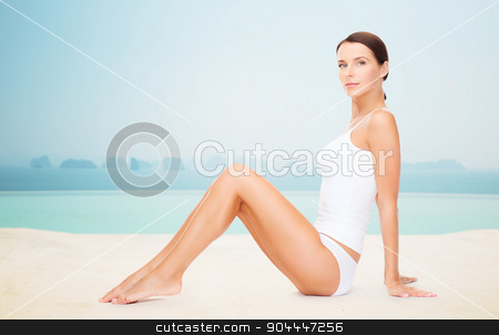 To use this stock image in your creative project, please select the size you need over to the right and click the "Add to Cart" button.
Your downloaded image will come with the Cutcaster watermark removed so don’t worry about the watermark you see on this page. beautiful woman in cotton underwear stock photo, people, beauty, spa and resort concept - beautiful woman in cotton underwear over infinity edge pool background by Syda Productions