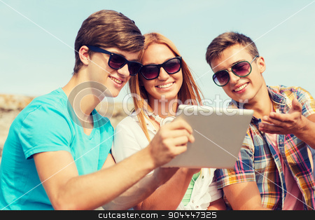 To use this stock image in your creative project, please select the size you need over to the right and click the "Add to Cart" button.
Your downloaded image will come with the Cutcaster watermark removed so don’t worry about the watermark you see on this page. group of smiling friends with tablet pc outdoors stock photo, friendship, leisure, summer, technology and people concept - group of smiling friends with tablet pc computer sitting outdoors by Syda Productions