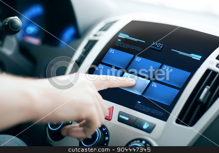 To use this stock image in your creative project, please select the size you need over to the right and click the "Add to Cart" button.
Your downloaded image will come with the Cutcaster watermark removed so don’t worry about the watermark you see on this page. hand pushing button on car control panel screen stock photo, transport, modern technology and people concept - male hand pushing button on car control panel screen by Syda Productions