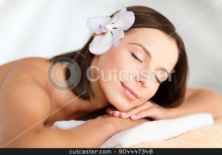 To use this stock image in your creative project, please select the size you need over to the right and click the "Add to Cart" button.
Your downloaded image will come with the Cutcaster watermark removed so don’t worry about the watermark you see on this page. beautiful woman with flower in her hair in spa stock photo, health, beauty, resort and relaxation concept - beautiful woman with flower in her hair in spa salon lying on the massage desk by Syda Productions