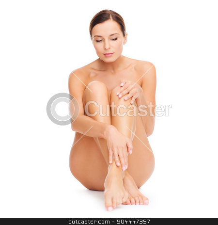 To use this stock image in your creative project, please select the size you need over to the right and click the "Add to Cart" button.
Your downloaded image will come with the Cutcaster watermark removed so don’t worry about the watermark you see on this page. beautiful naked woman touching her legs stock photo, health and beauty concept - beautiful naked woman touching her legs by Syda Productions