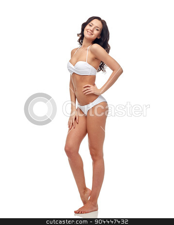 To use this stock image in your creative project, please select the size you need over to the right and click the "Add to Cart" button.
Your downloaded image will come with the Cutcaster watermark removed so don’t worry about the watermark you see on this page. happy young woman in white bikini swimsuit stock photo, people, fashion, swimwear, summer and beach concept - happy young woman in white bikini swimsuit by Syda Productions