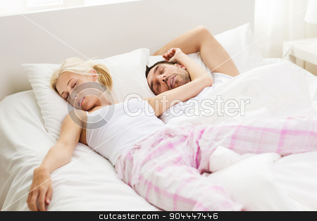 To use this stock image in your creative project, please select the size you need over to the right and click the "Add to Cart" button.
Your downloaded image will come with the Cutcaster watermark removed so don’t worry about the watermark you see on this page. happy couple sleeping in bed at home stock photo, people, family, bedtime and happiness concept - happy couple sleeping in bed at home by Syda Productions