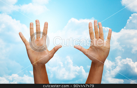 To use this stock image in your creative project, please select the size you need over to the right and click the "Add to Cart" button.
Your downloaded image will come with the Cutcaster watermark removed so don’t worry about the watermark you see on this page. two african hands making high five over blue sky stock photo, gesture, people and body parts concept - african woman two hands showing palms or making high five over blue sky and clouds background by Syda Productions