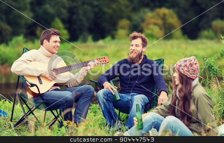 To use this stock image in your creative project, please select the size you need over to the right and click the "Add to Cart" button.
Your downloaded image will come with the Cutcaster watermark removed so don’t worry about the watermark you see on this page. group of tourists playing guitar in camping stock photo, adventure, travel, tourism and people concept - group of smiling tourists playing guitar and drinking beer in camping by Syda Productions