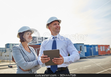 To use this stock image in your creative project, please select the size you need over to the right and click the "Add to Cart" button.
Your downloaded image will come with the Cutcaster watermark removed so don’t worry about the watermark you see on this page. happy builders in hardhats with tablet pc outdoors stock photo, business, building, teamwork, technology and people concept - smiling man and woman in hardhats with tablet pc computer at construction site by Syda Productions