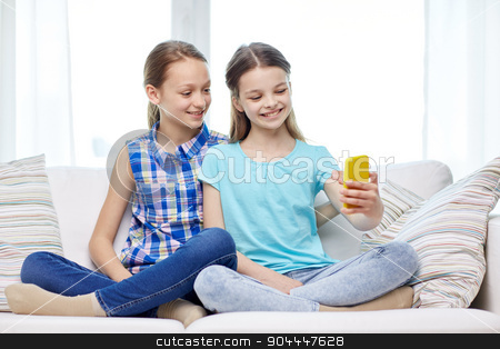 To use this stock image in your creative project, please select the size you need over to the right and click the "Add to Cart" button.
Your downloaded image will come with the Cutcaster watermark removed so don’t worry about the watermark you see on this page. happy girls with smartphone taking selfie at home stock photo, people, children, technology, friends and friendship concept - happy little girls sitting on sofa and taking selfie with smartphone at home by Syda Productions