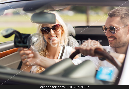 To use this stock image in your creative project, please select the size you need over to the right and click the "Add to Cart" button.
Your downloaded image will come with the Cutcaster watermark removed so don’t worry about the watermark you see on this page. happy couple usin gps navigation system in car stock photo, road trip, leisure, travel, technology and people concept - happy man and woman driving car and using gps navigation system by Syda Productions