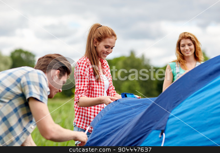 To use this stock image in your creative project, please select the size you need over to the right and click the "Add to Cart" button.
Your downloaded image will come with the Cutcaster watermark removed so don’t worry about the watermark you see on this page. group of smiling friends setting up tent outdoors stock photo, camping, travel, tourism, hike and people concept - group of smiling friends setting up tent outdoors by Syda Productions