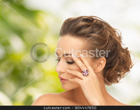 To use this stock image in your creative project, please select the size you need over to the right and click the "Add to Cart" button.
Your downloaded image will come with the Cutcaster watermark removed so don’t worry about the watermark you see on this page. woman with purple cocktail ring stock photo, bride and wedding concept - beautiful woman with purple cocktail ring by Syda Productions