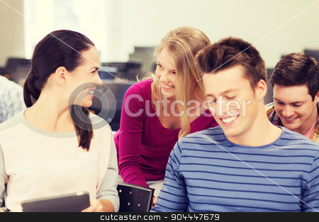 To use this stock image in your creative project, please select the size you need over to the right and click the "Add to Cart" button.
Your downloaded image will come with the Cutcaster watermark removed so don’t worry about the watermark you see on this page. group of smiling students with tablet pc stock photo, education, high school, teamwork and people concept - group of smiling students with tablet pc computers sitting in lecture hall by Syda Productions